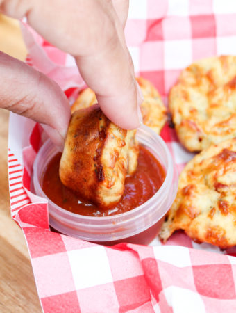 pizza muffin dipped in sauce