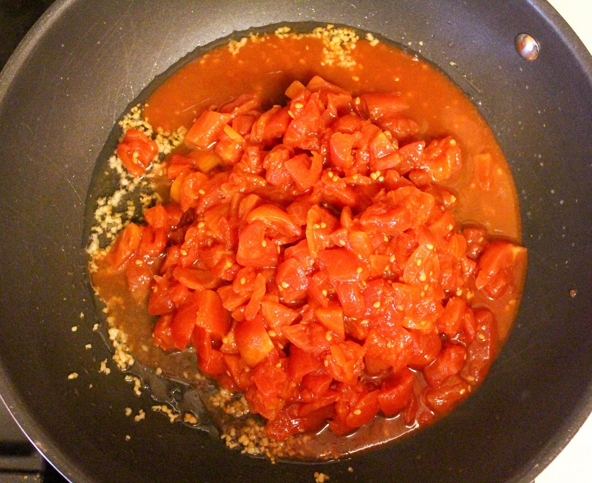 tomatoes cooking in skillet