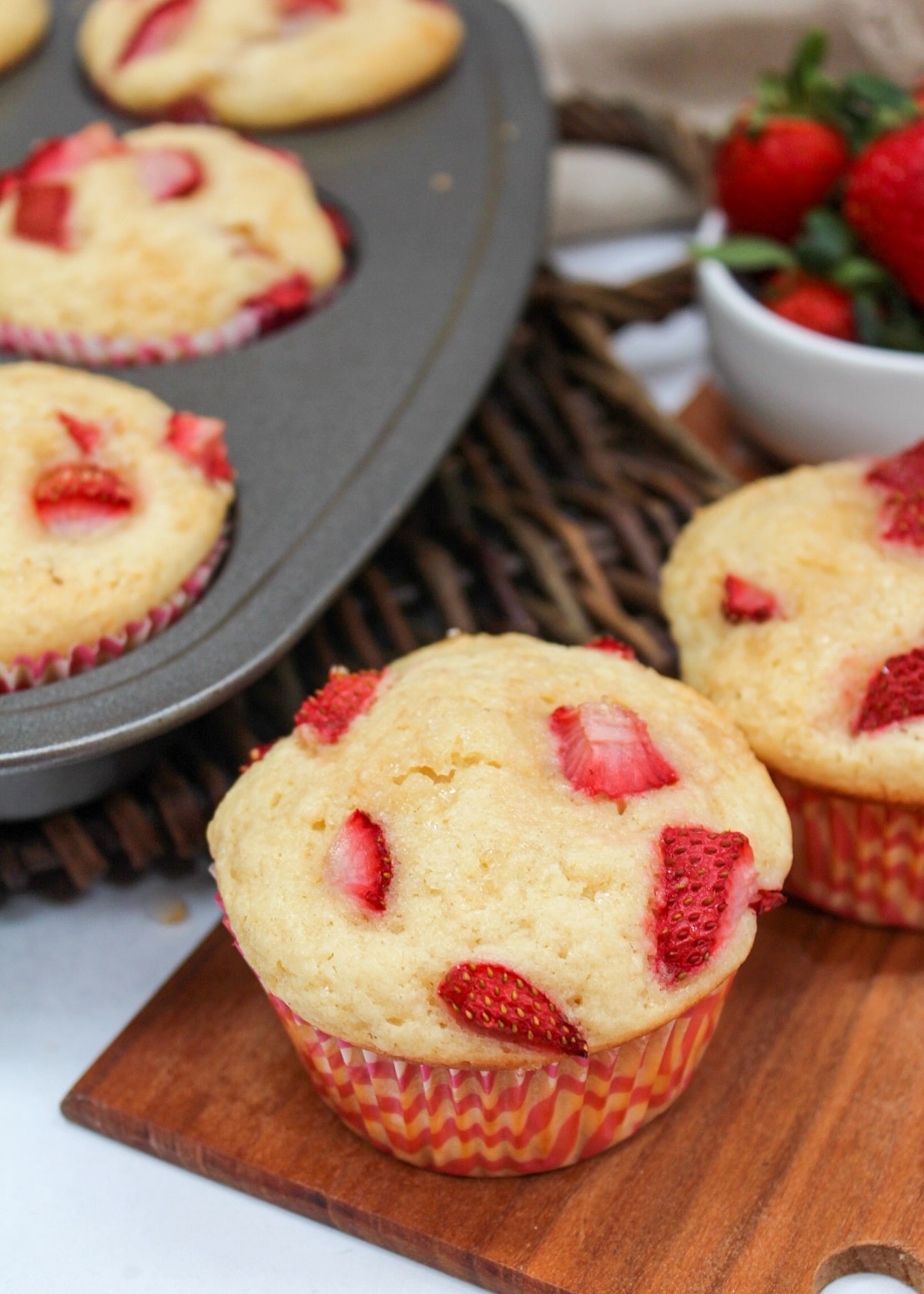 strawberries and cream muffins on serving board