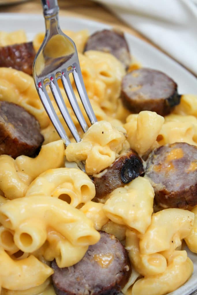 pasta and brats on a plate