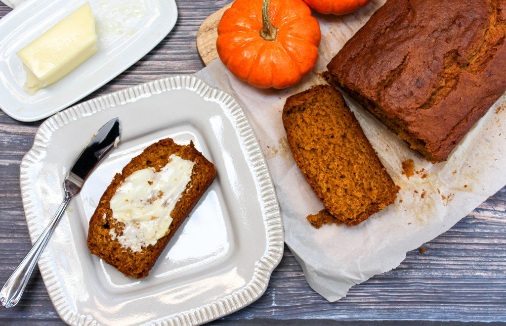 pumpkin bread in a pan and plate