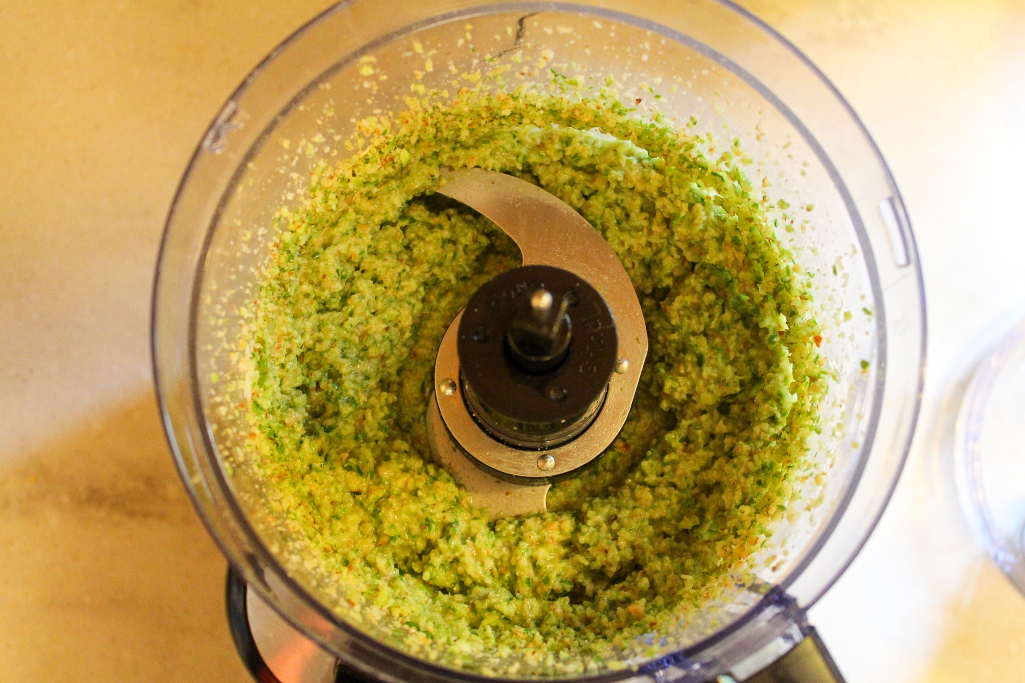 scapes and almonds in food processor blended