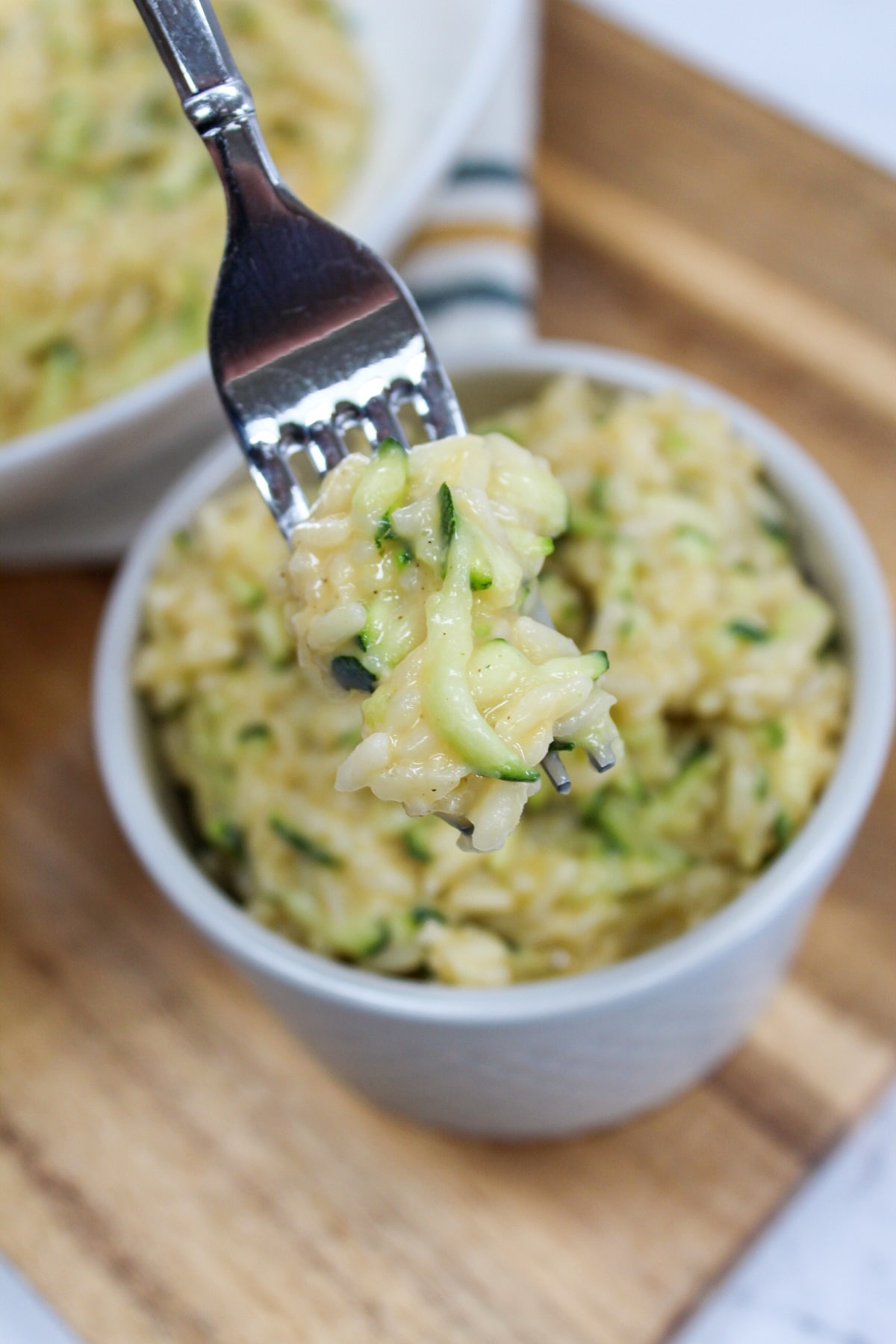 cheesy zucchini rice on a fork