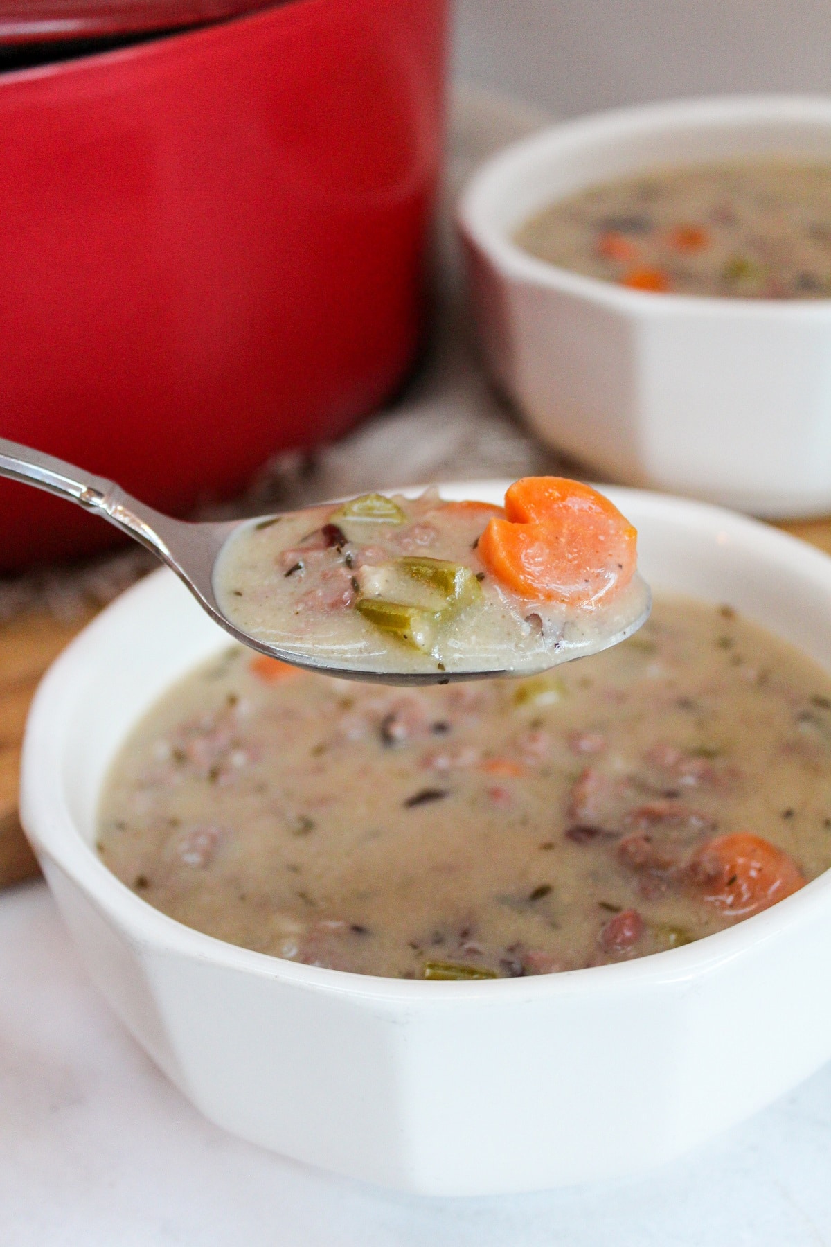 Creamy Wild Rice and Sausage Soup on a spoon