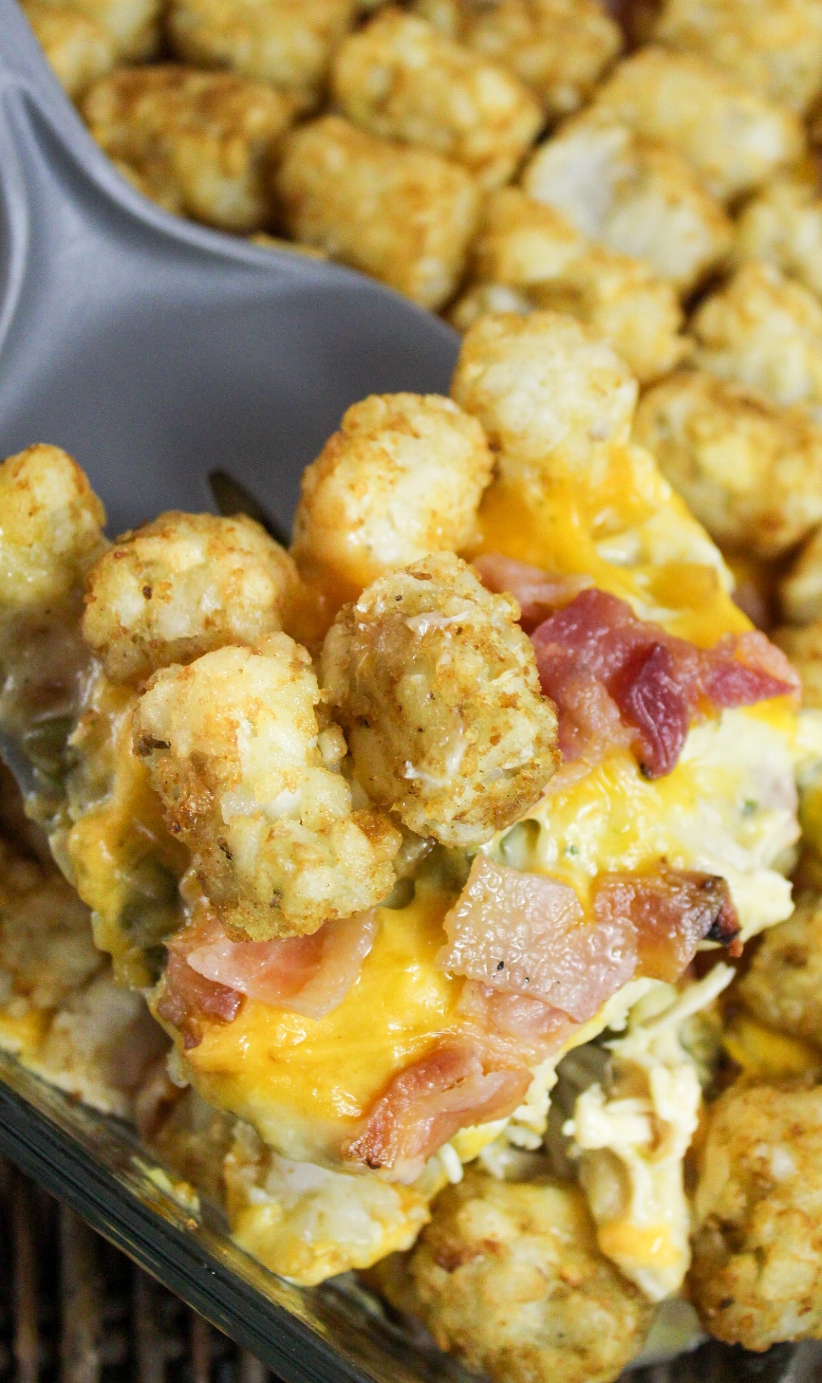 chicken bacon ranch tater tot casserole on a spatula