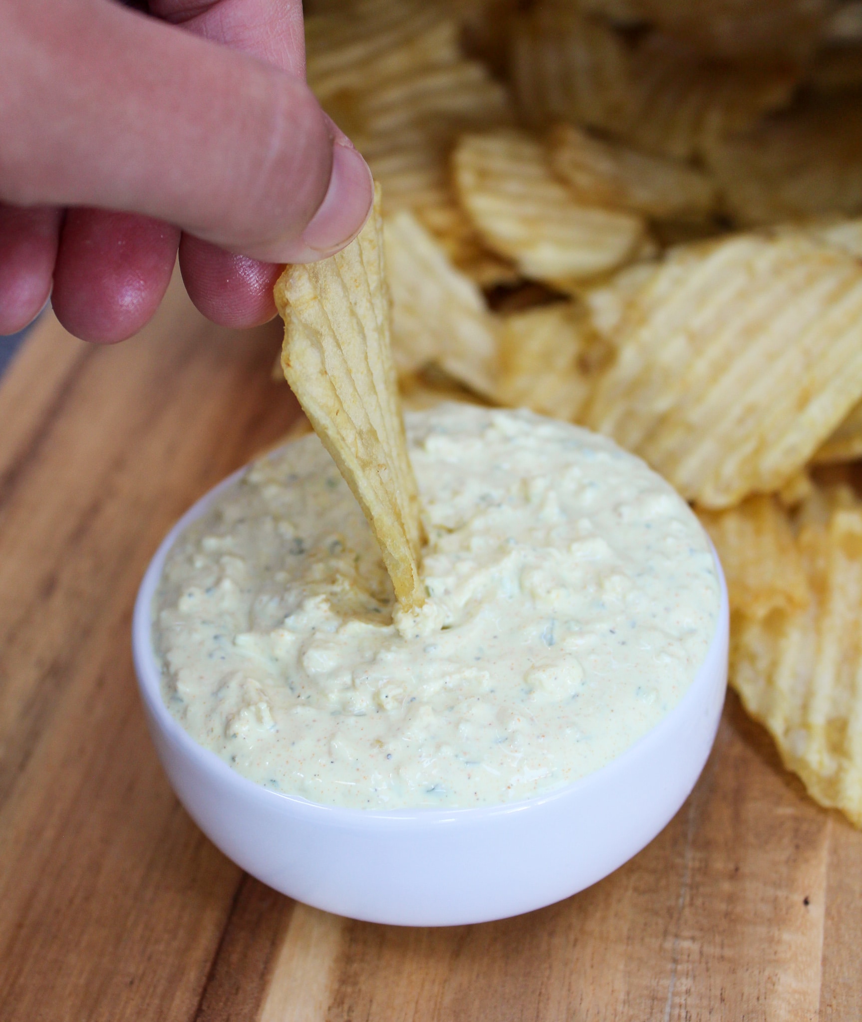 dip in a bowl with chips