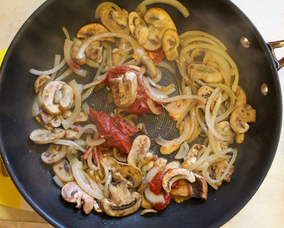 mushrooms and onions in pan