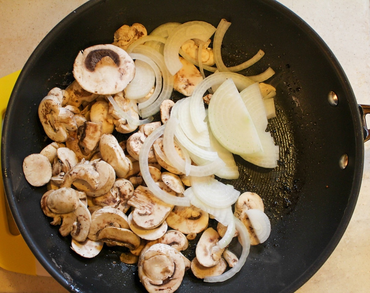 mushrooms and onions in pan