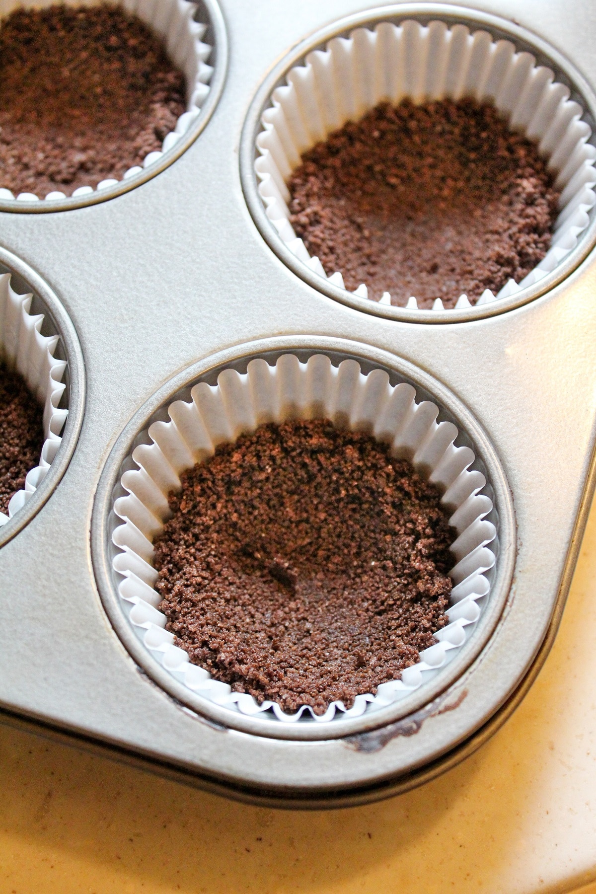 chocolate crust in muffin tin
