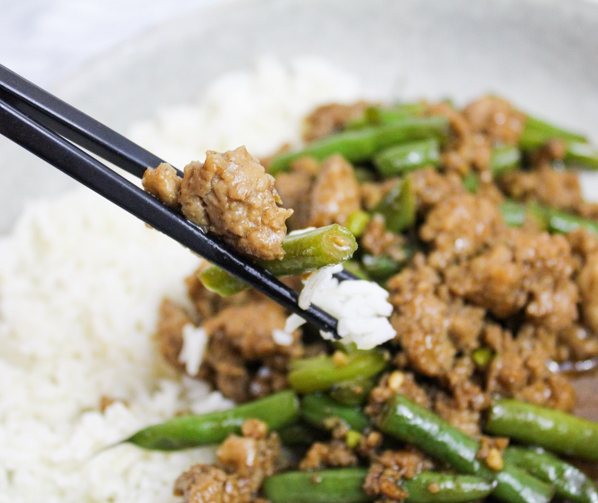 Szechuan Green Beans and Ground Pork on chopsticks