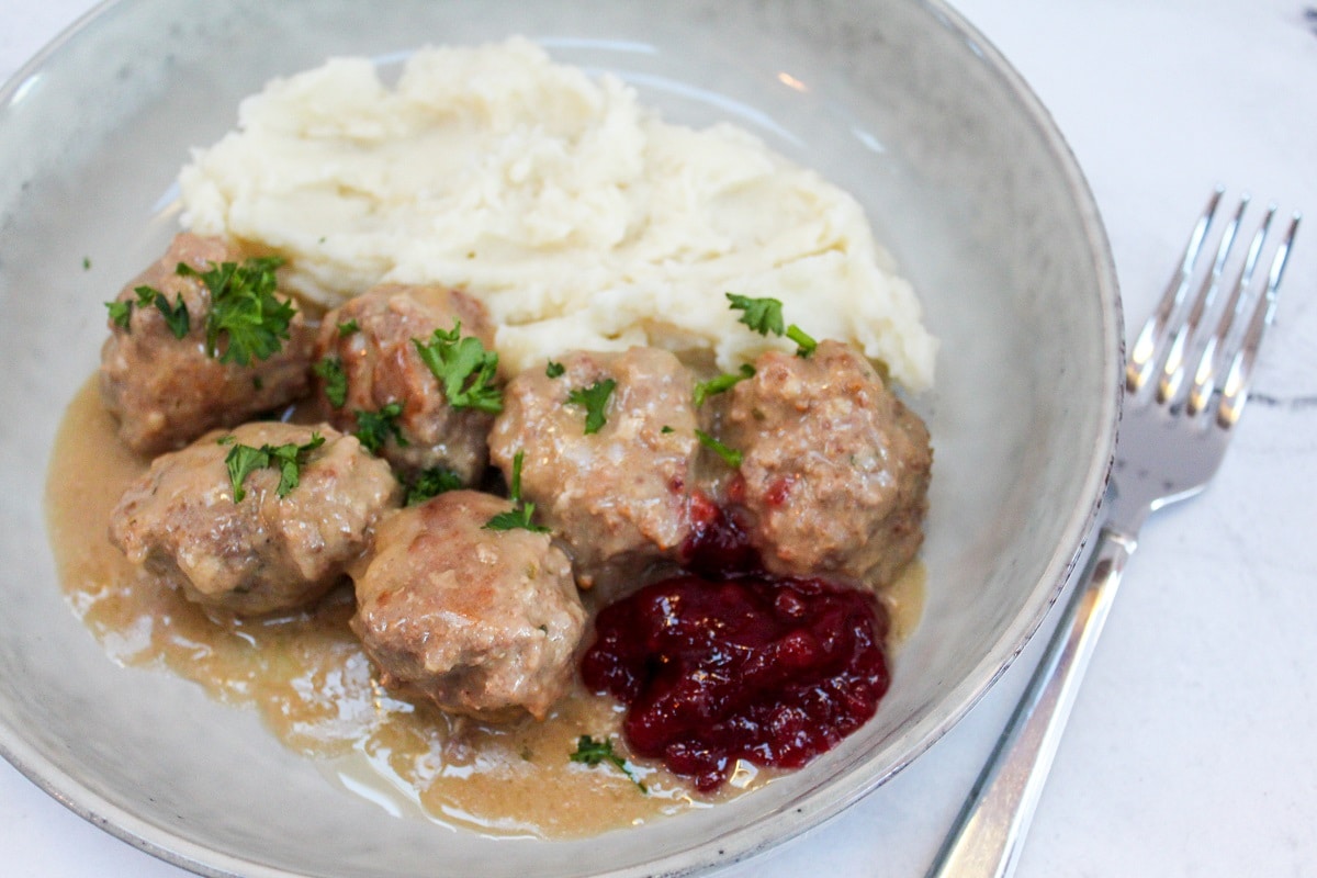plated meatballs with potatoes