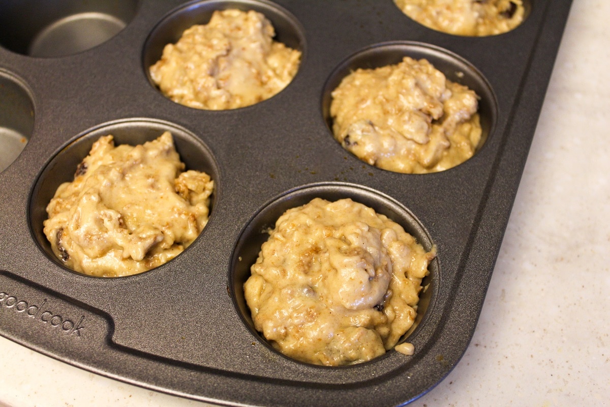 uncooked muffins in pan