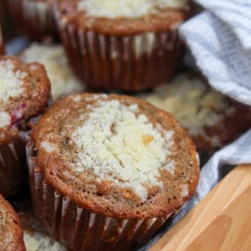 tart cherry crumb muffins in a basket