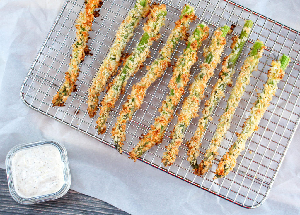 asparagus fries on a baking sheet
