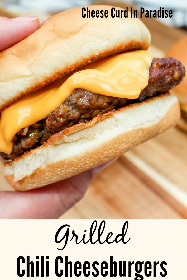 Cheeseburger held in hand for pinterest pin