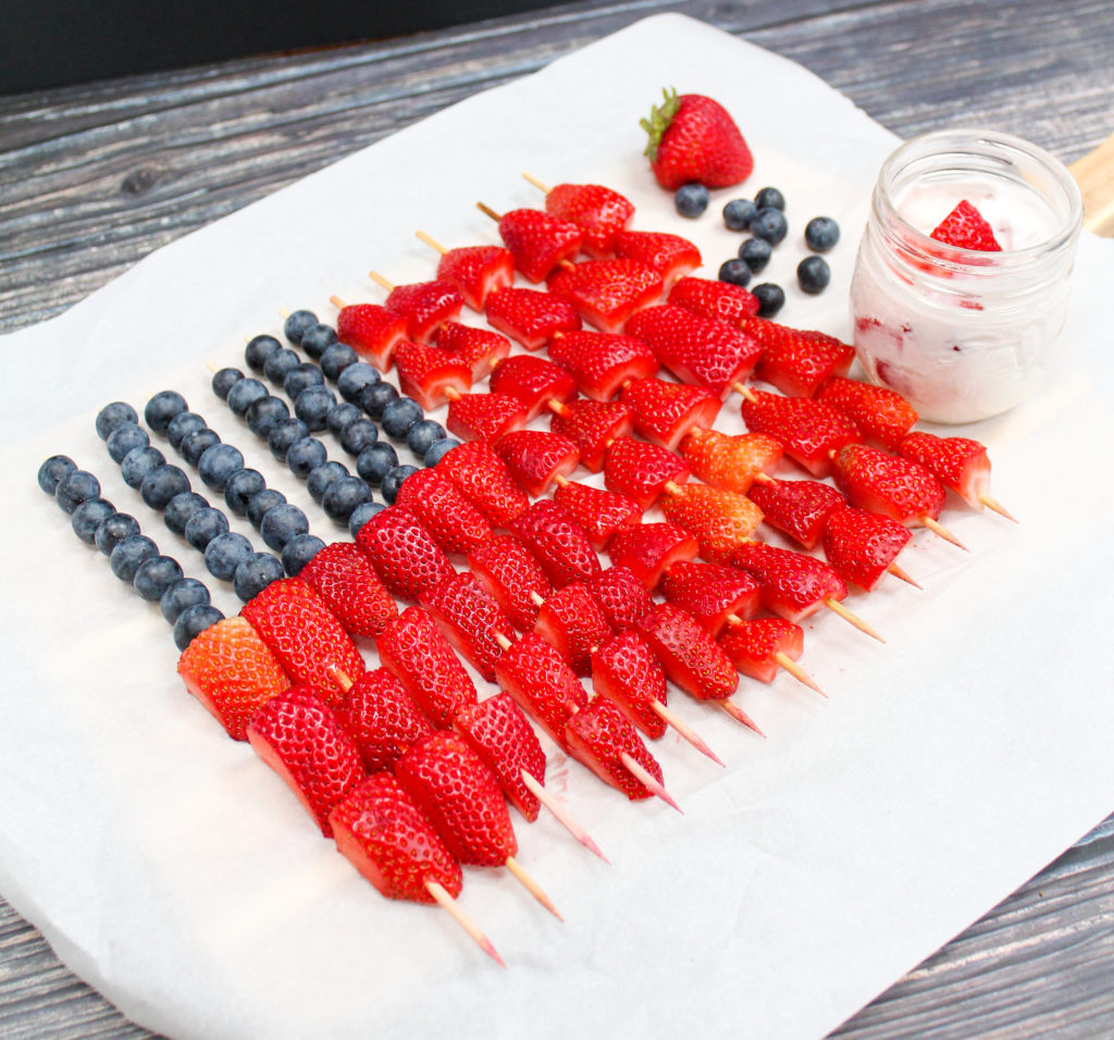 fruit kabobs on a tray