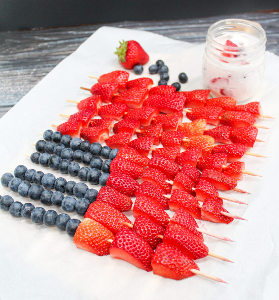 fruit kabobs on a tray