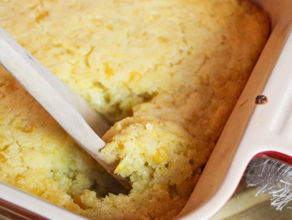 corn casserole scooped from a dish