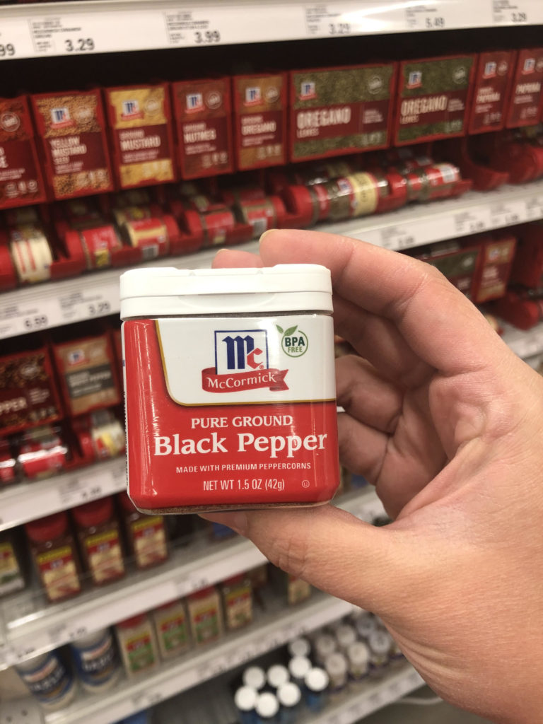 black pepper held in hand