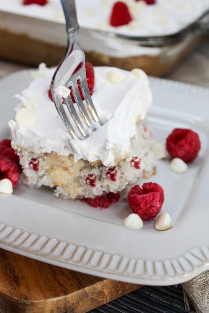 fork with Raspberry White Chocolate Poke Cake