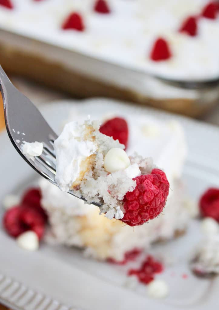 fork with Raspberry White Chocolate Poke Cake
