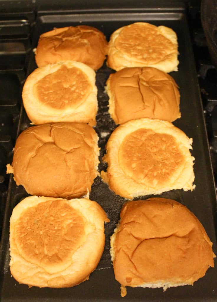 buns toasting on flat top