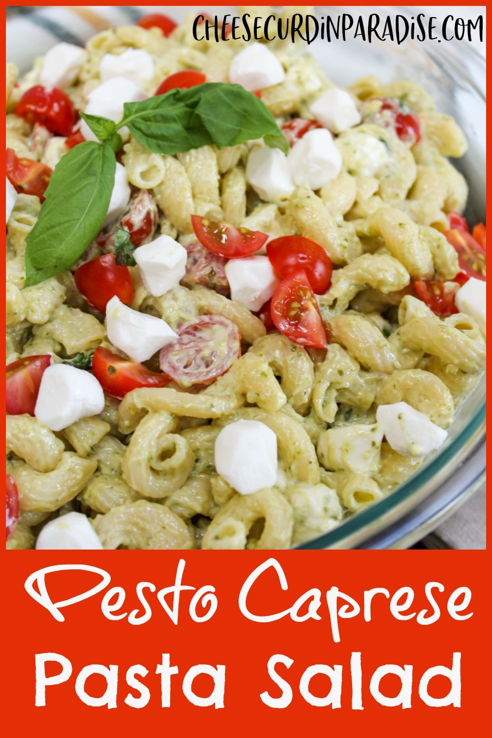pasta salad in a glass bowl with title text fr Pinterest