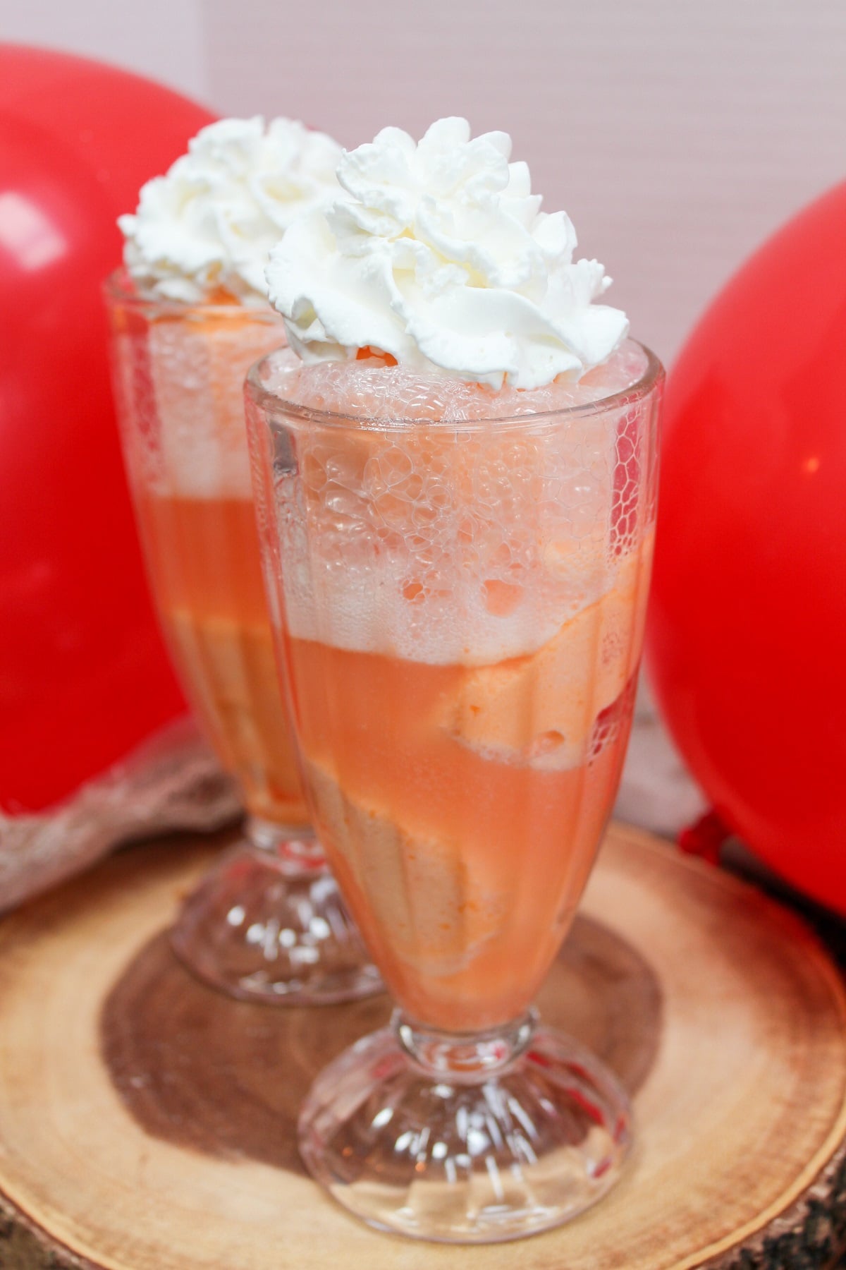 ice cream float in a glass with whipped cream