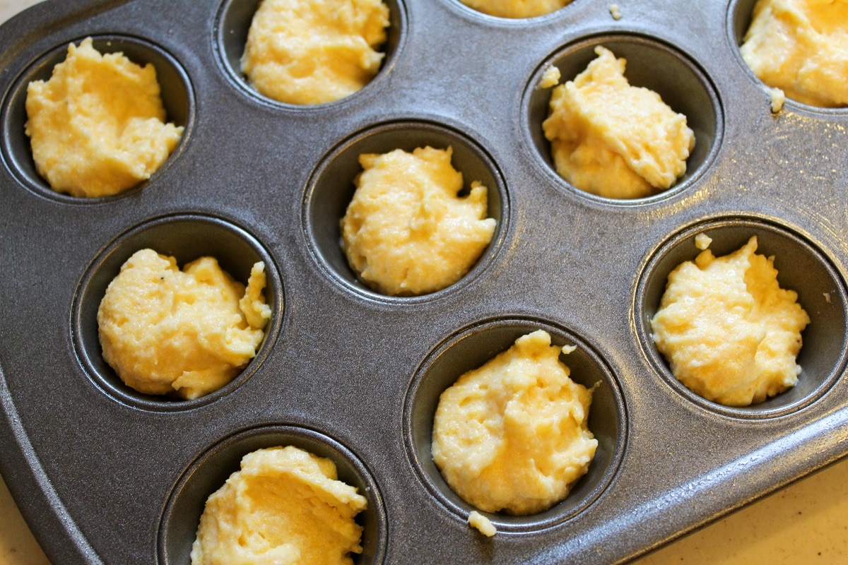 corn muffin uncooked in pan