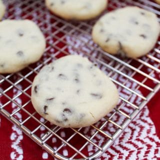 whipped chocolate chip shortbread cookies on a cooling wrack