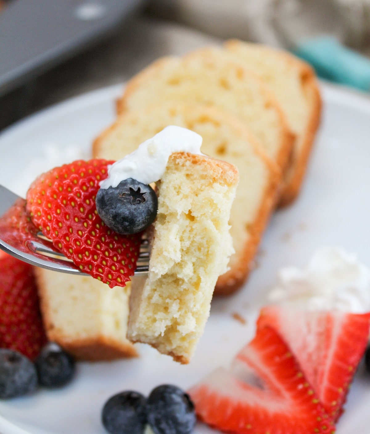 cake on a fork with berries