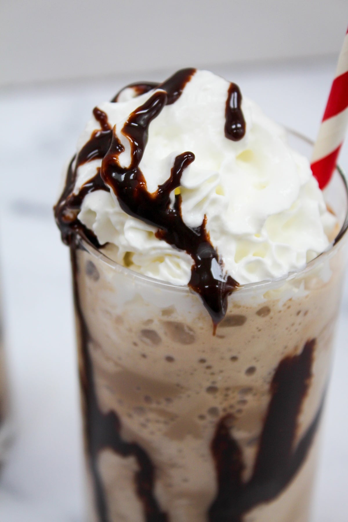Blended Mocha Frappe with red and white straw