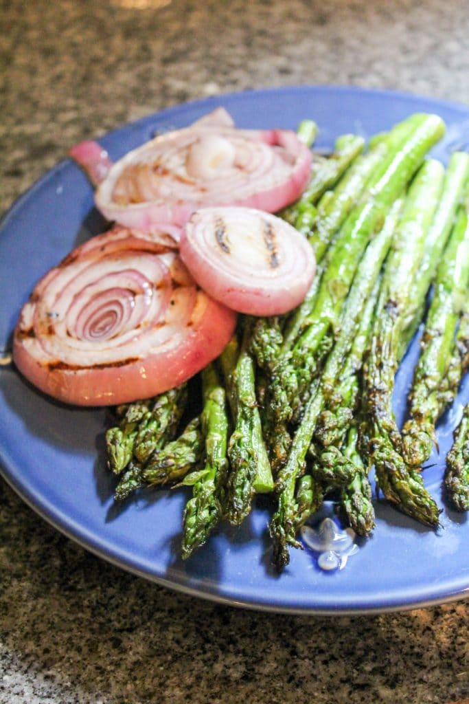 asparagus on a blue plate