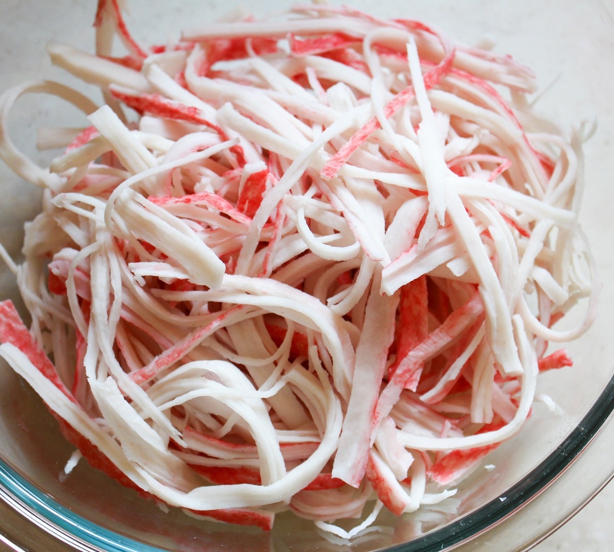 strips of kani in a bowl