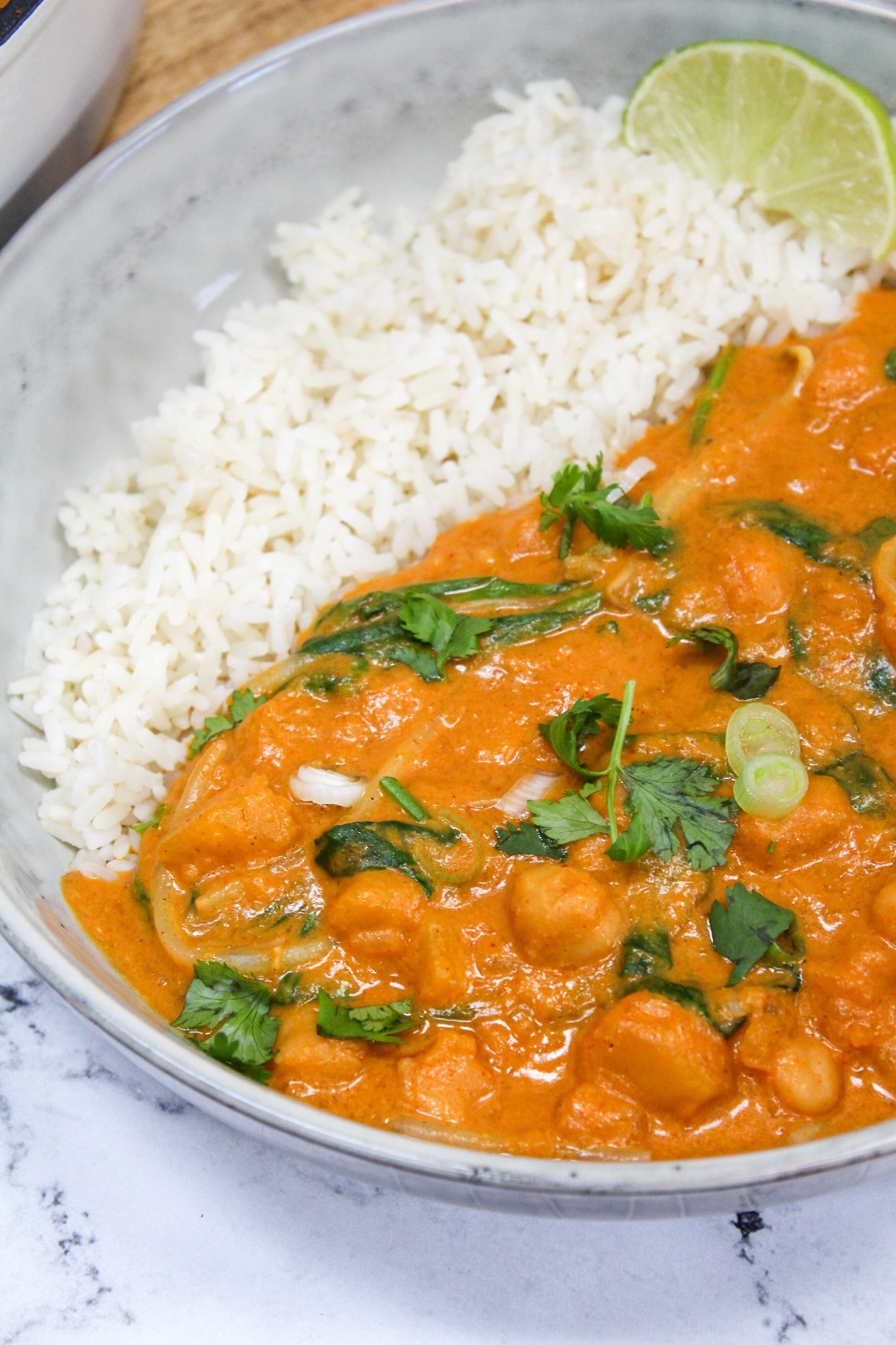 thai butternut squash curry in a bowl with rice