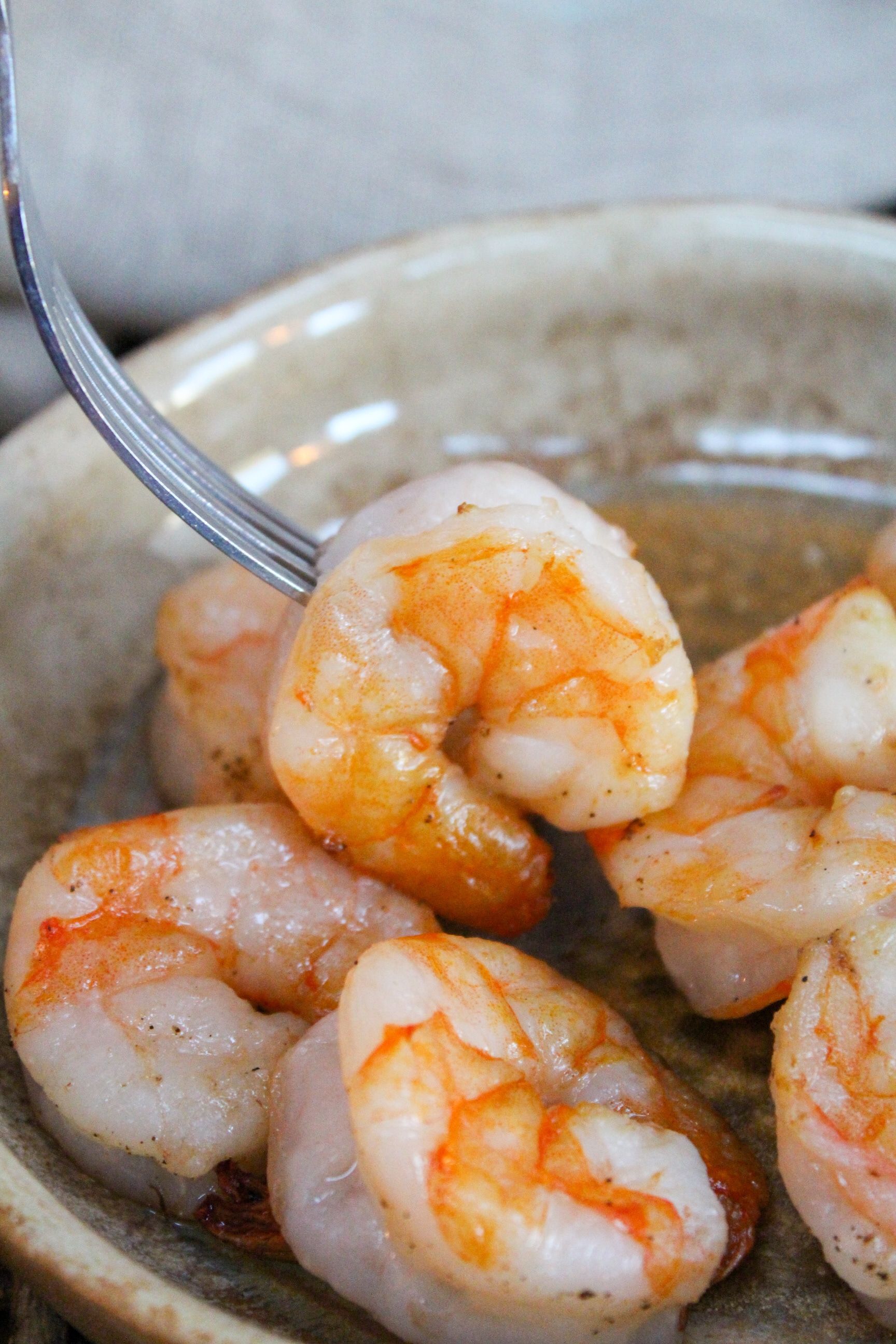 cooked shrimp on a fork