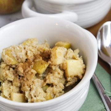 slow cooker apple cinnamon oatmeal in a white bowl
