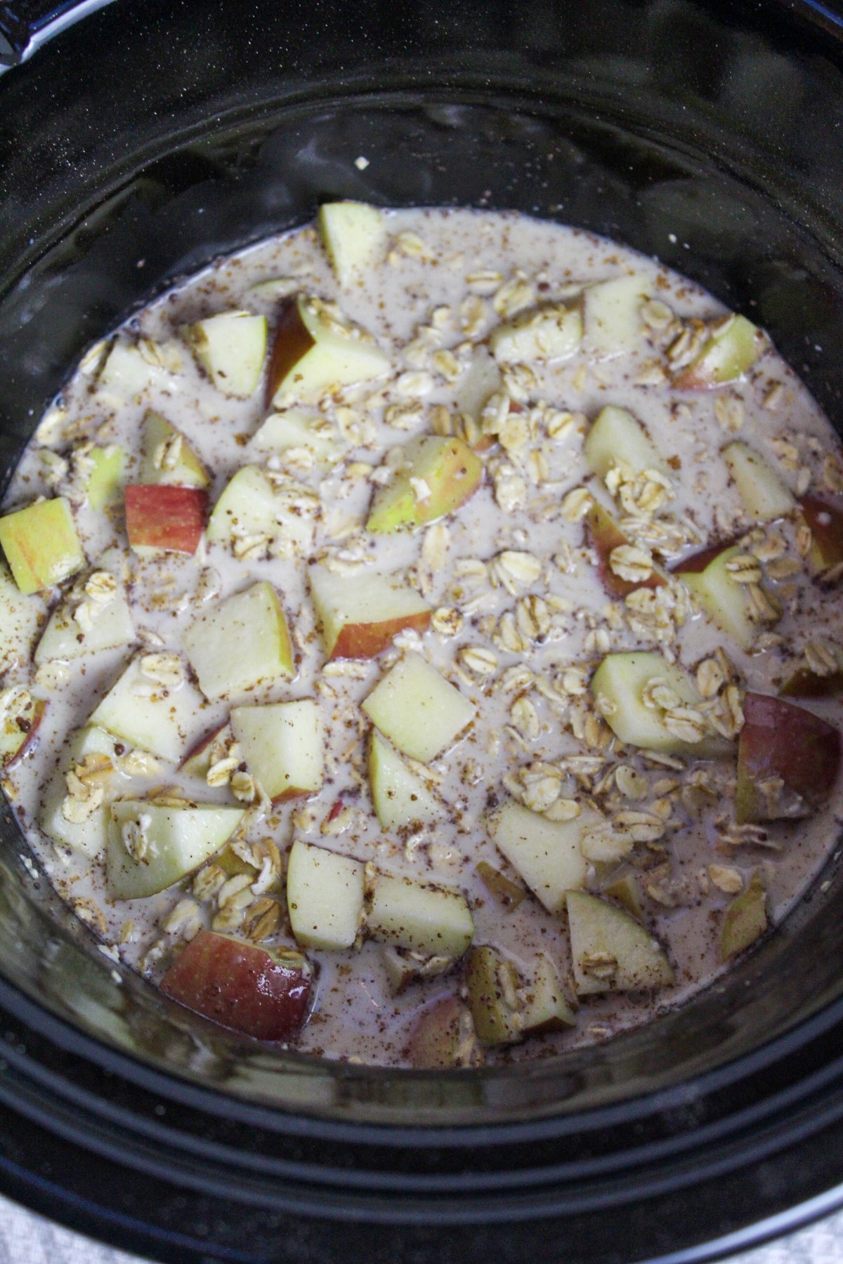 slow cooker apple cinnamon oatmeal in a slow cooker uncooked