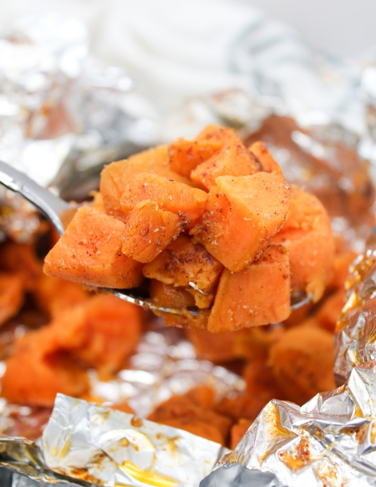 grilled sweet potatoes on a spoon.